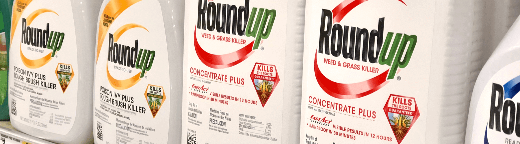 Wide view of Roundup bottles on a shelf in a store